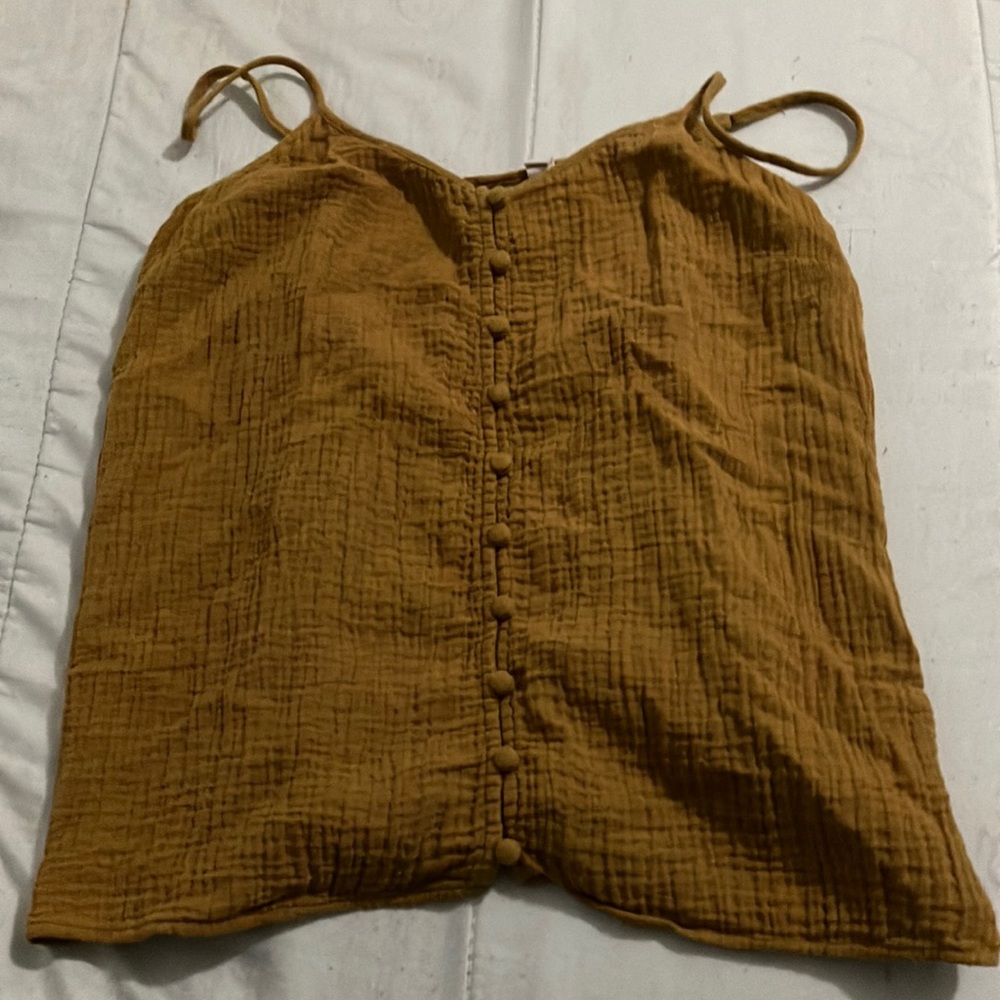 Dolan size small brown shirt with buttons down the middle